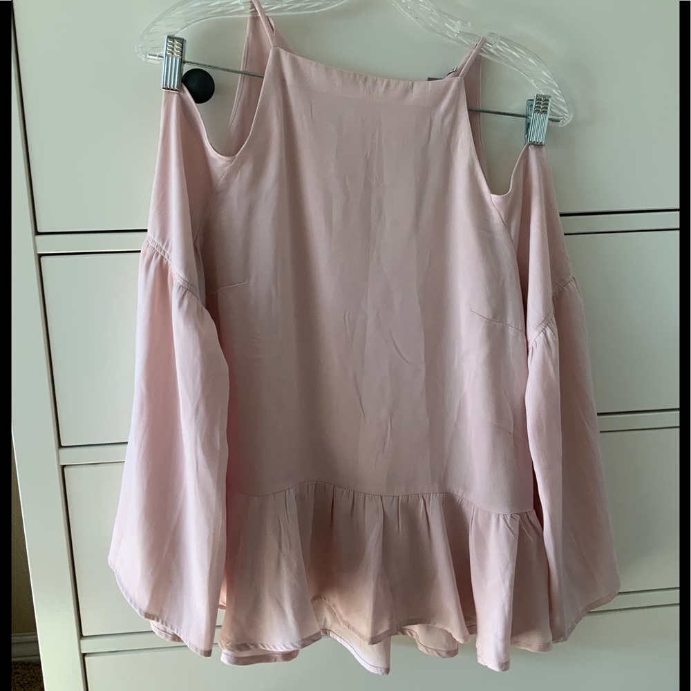 Chelsea peplum blouse w/ peekaboo shoulders. Size XS